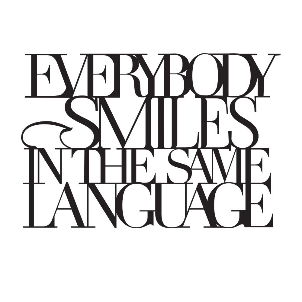 Wandpoesie "Everbody Smiles in the Same Language"